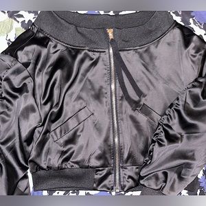 Rarely worn, perfect condition black satin off the shoulder,bomber zip up jacket